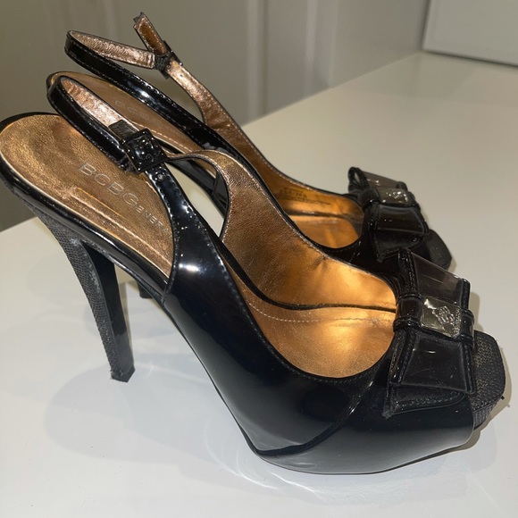 Black BCBGeneration sling back heels with bows